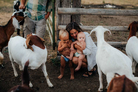 Eva with Kids and Goats